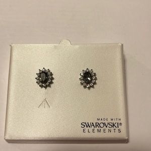 Swarovski elements blue/gray stud earrings. Never worn.